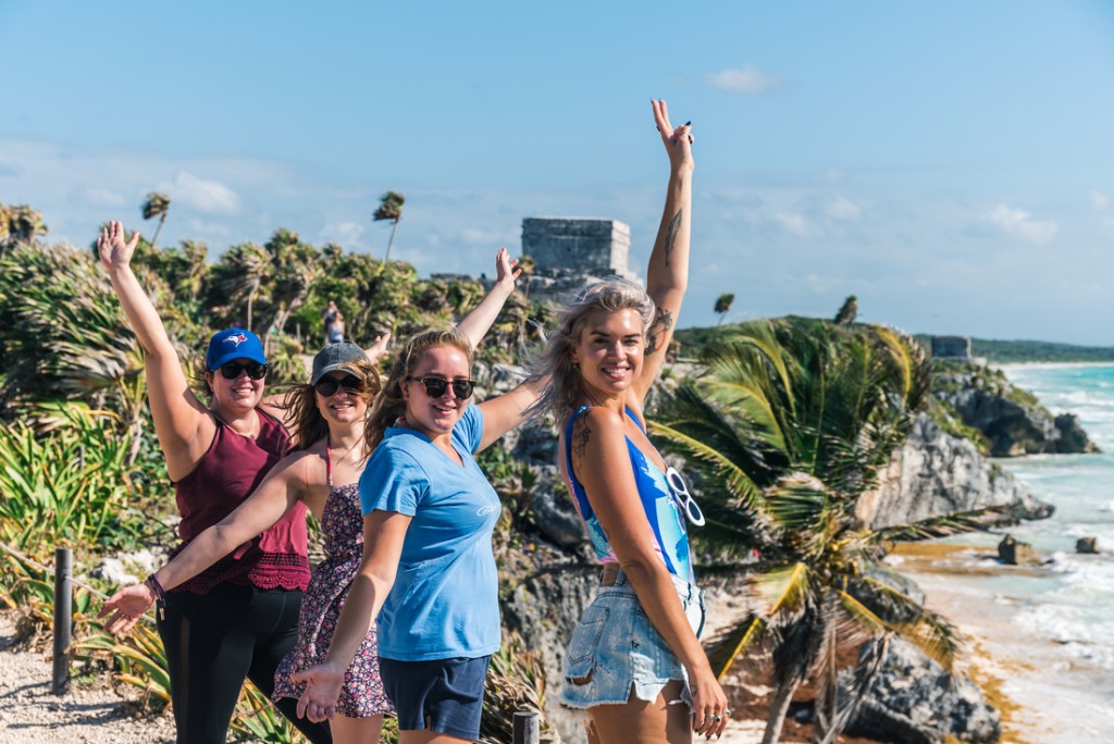 Intrepid Travel-mexico_tulum_travellers_ruins_smiling_group_25