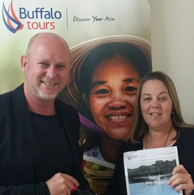 One of the lucky winners Debbie Tripp being award her prize by Matthew Edwards of Buffalo Tours