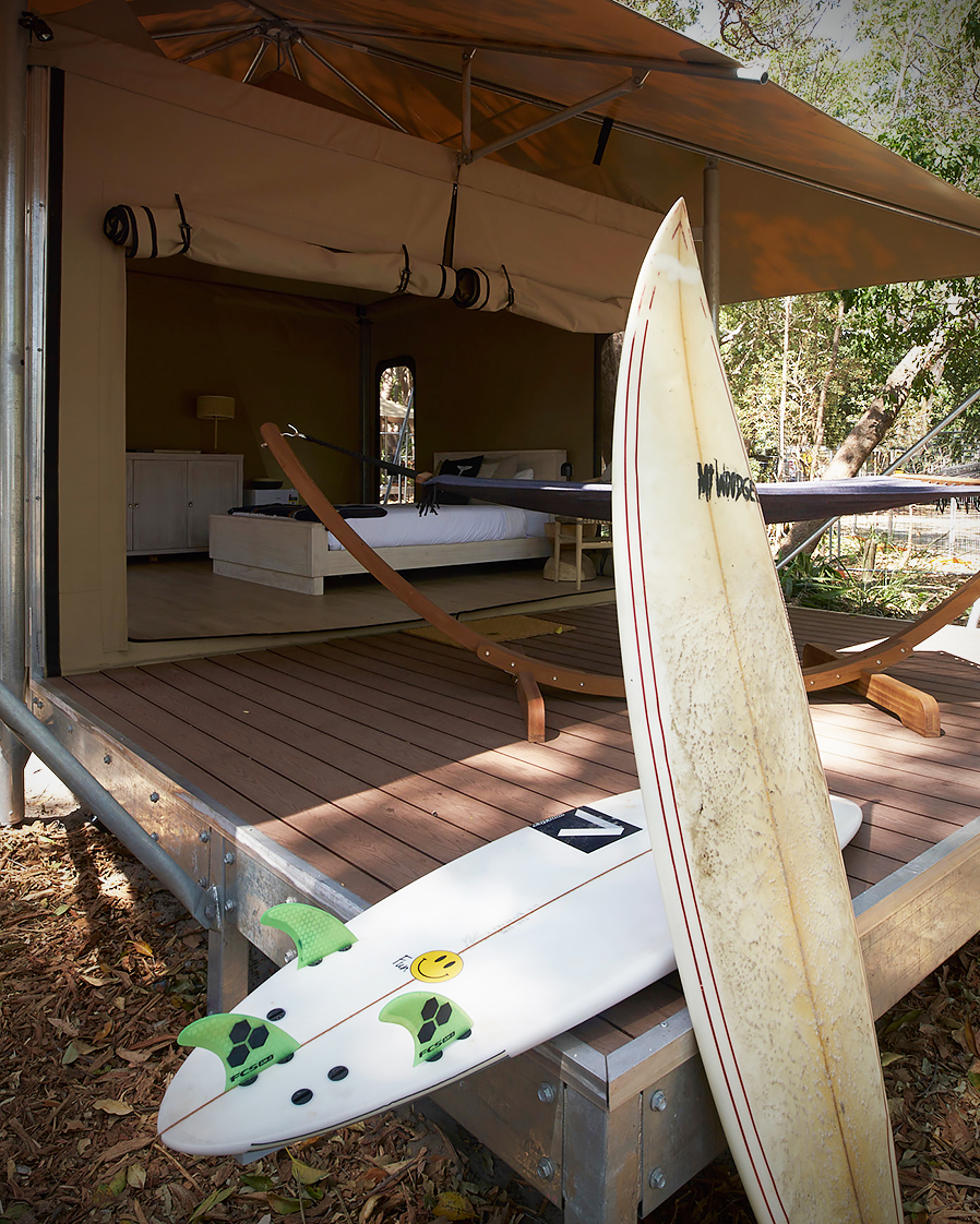 Minjerribah Island Eco Tents with surfboards