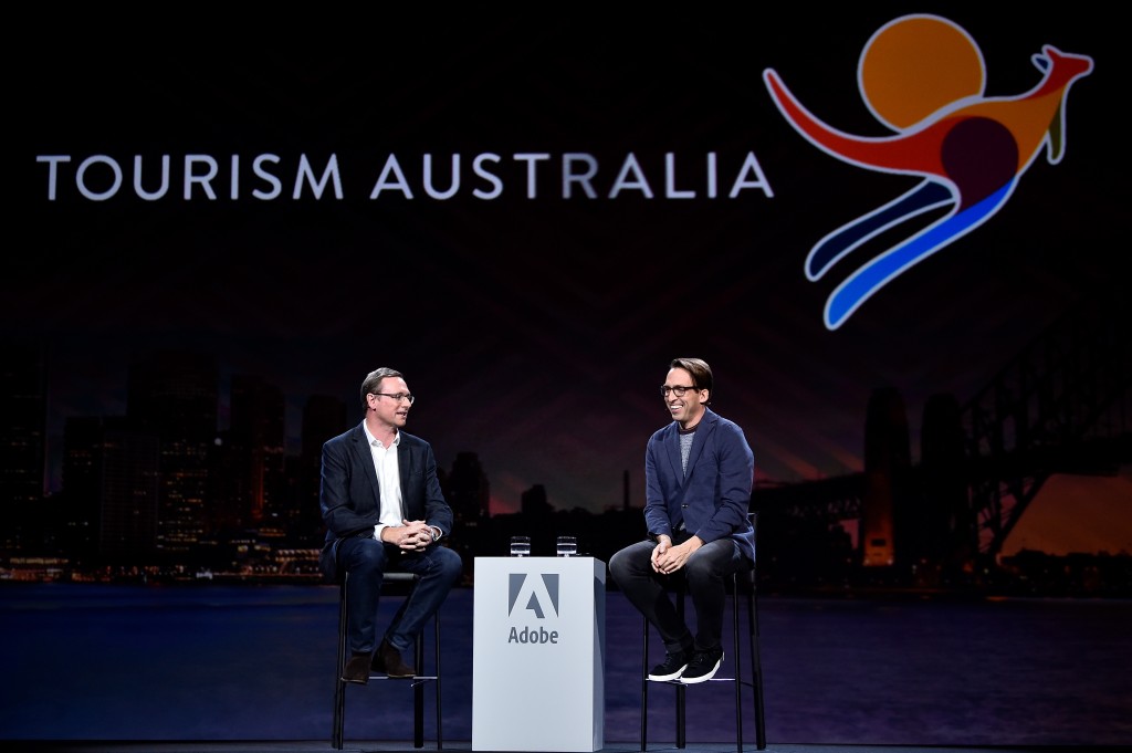 John O'Sullivan, Managing Director Tourism Australia (L) speaks with Brad Rencher, EVP and GM of Adobe Experience Cloud during Adobe Summit at the Venetian on Tuesday, March 27, 2018, in Las Vegas. (Photo by Jeff Bottari/Invision for Adobe/AP Images)