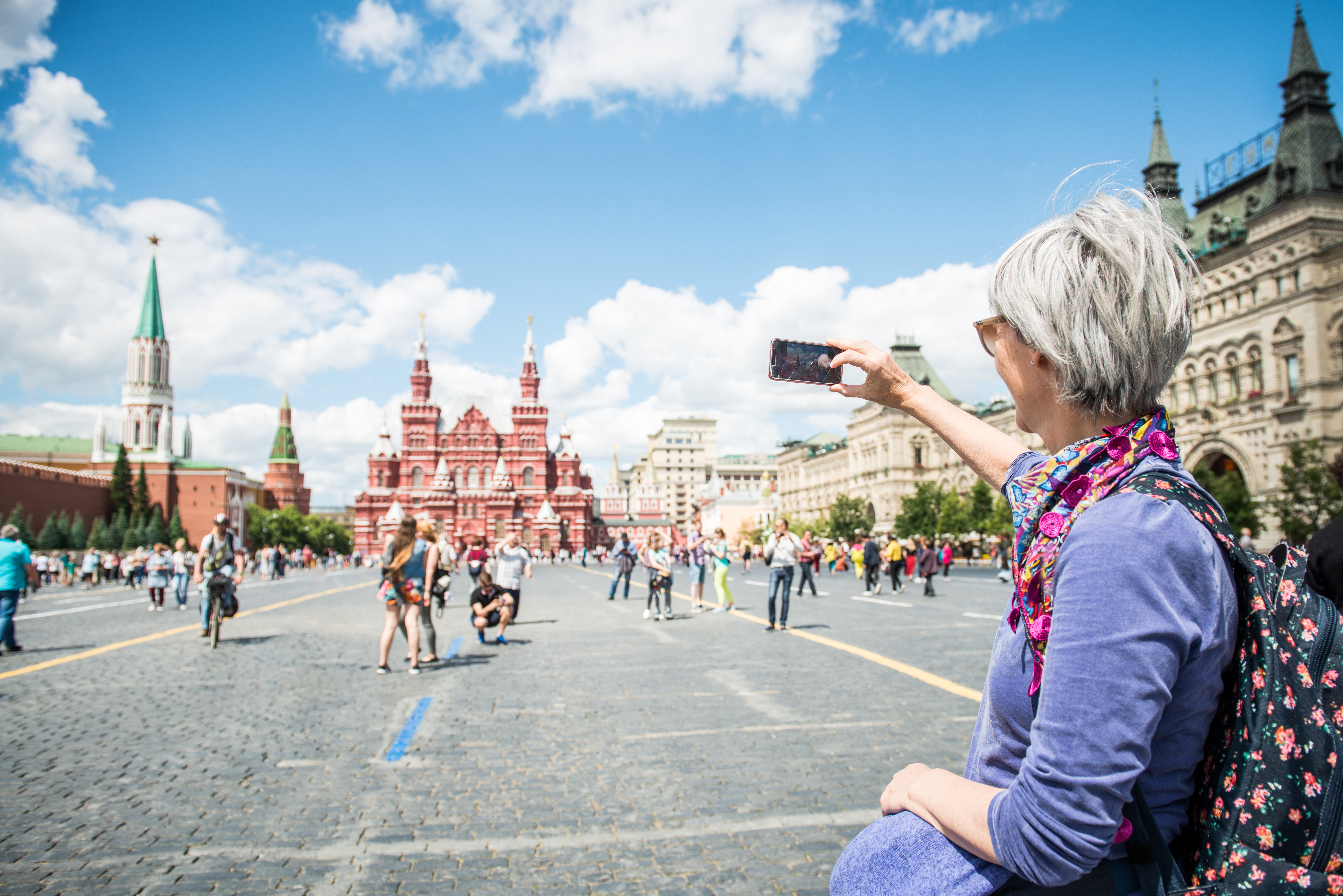 Portrait of a Beautiful Mature Woman Photographing Red Square in Moscow, Russia