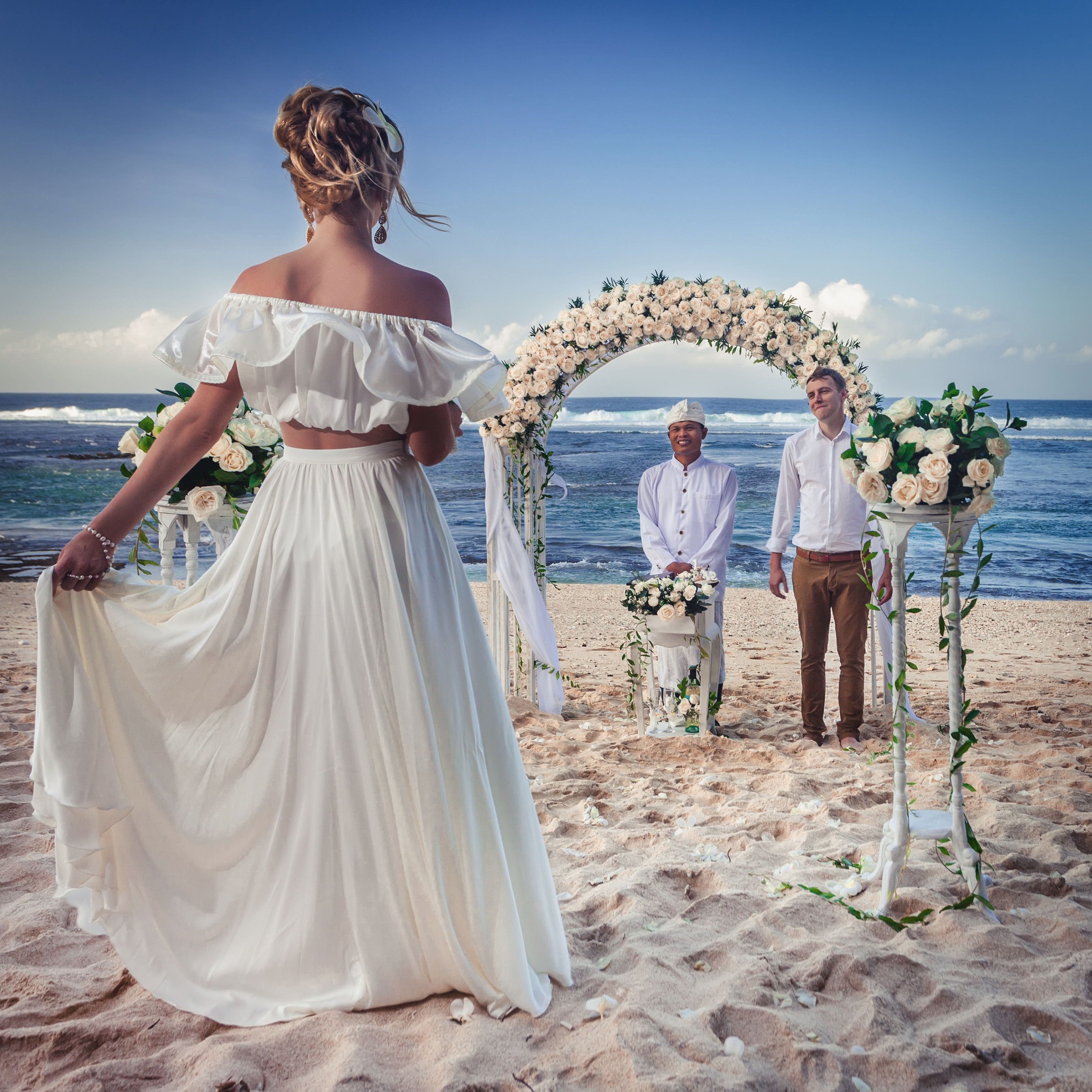Wedding couple just married at the beach, Bali. Wedding ceremony