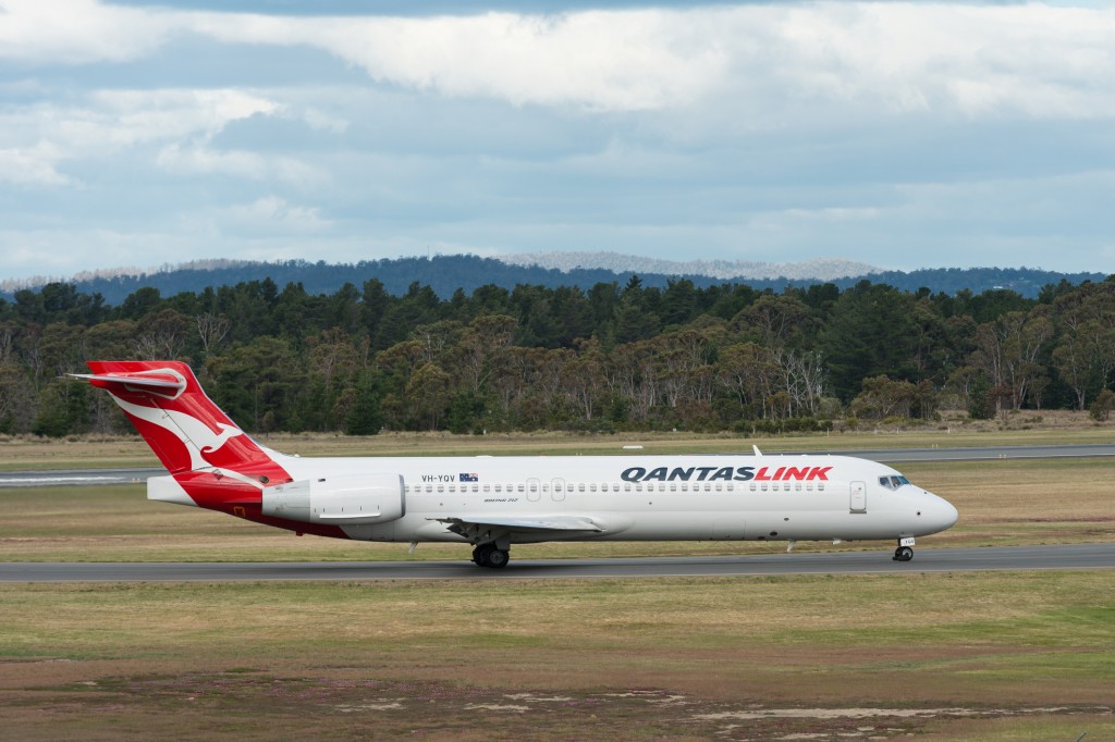 QantasLink Australia passenger airliner landing.