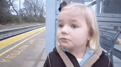 Girl in awe of train