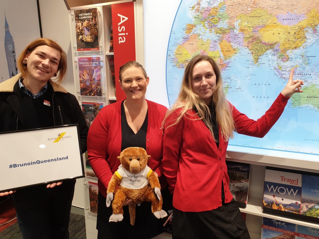 Michael Gehrke, Kathryn McClean and Tamika Lanham (Flight Centre Tailor Made at Mt Ommaney) with Bruno the monkey