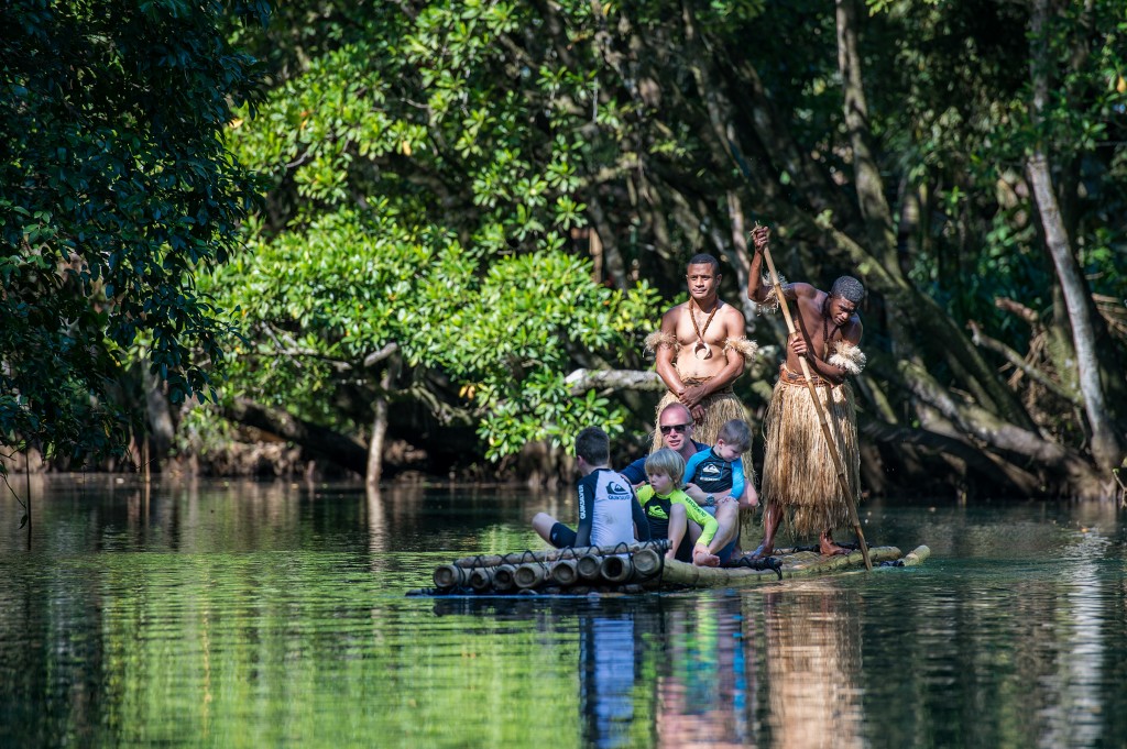 Nanuku family rafting down river