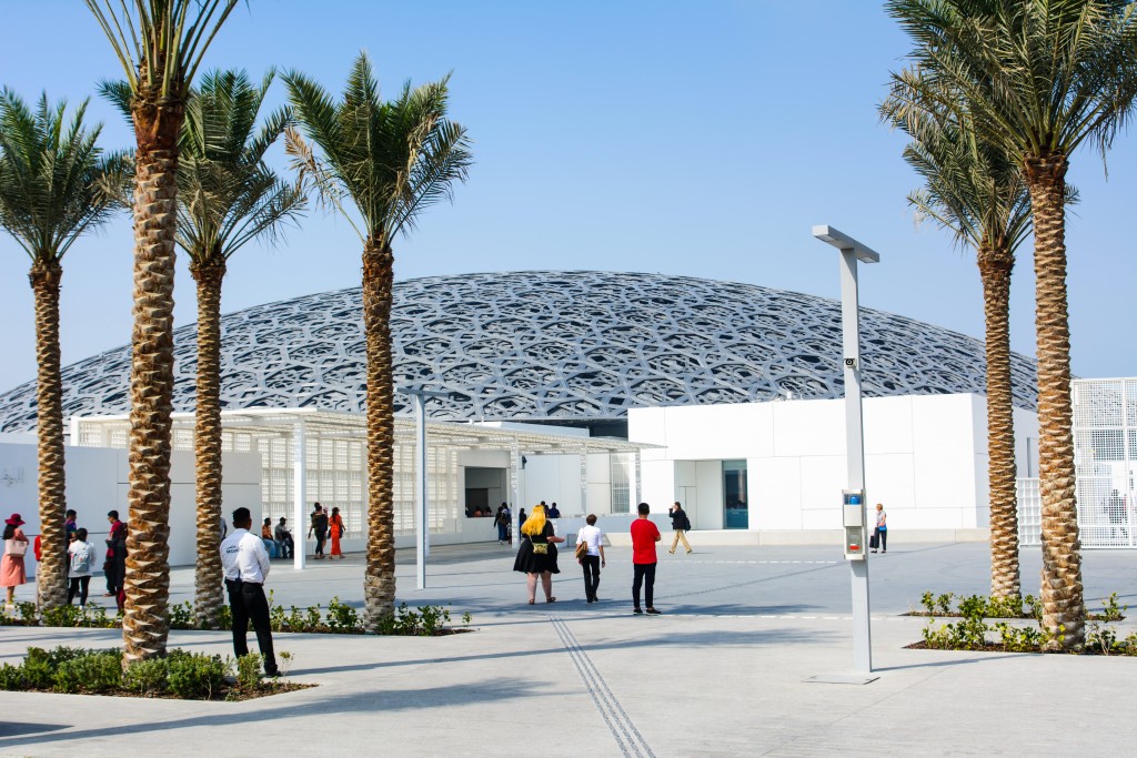 Louvre Abu Dhabi building exterior on a sunny day