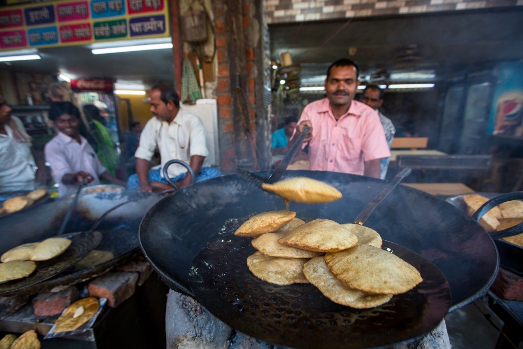 Indian street food vendors near the holy Ganges river.